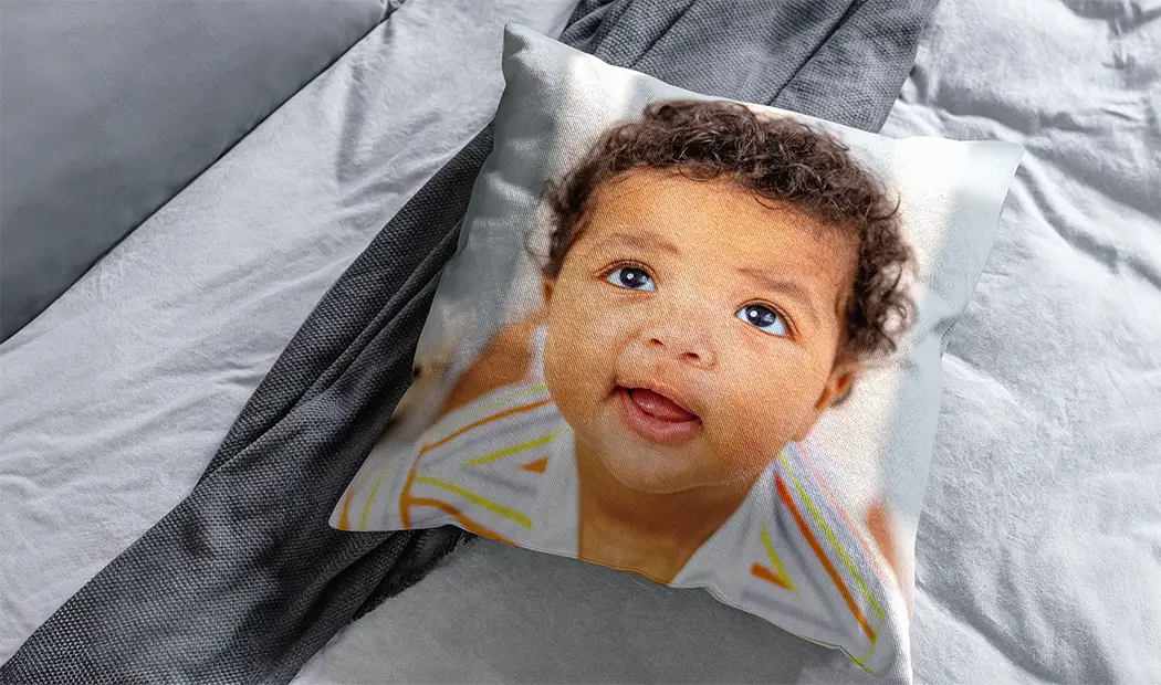 Personalised Cushion Covers|Personalised cushion featuring a happy family in sunglasses, making summer memories.  Create yours today!|Happy woman hugs personalised cushion featuring a vibrant photo of a couple.  Create your unique keepsake!|Personalised cushion featuring two friends, high-quality print on premium fabric.  Fully customisable!|Personalised cushion featuring a happy family photo, placed on a sofa.  Create a unique keepsake!|Personalised cushion featuring a watercolour butterfly design, initial & name.  A unique, thoughtful gift.|||||