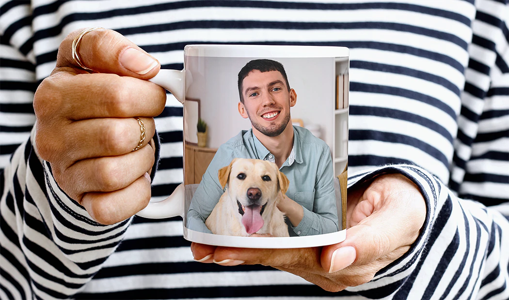 Personalised Photo Mugs by Printerpix|Mum and baby holding Printerpix cartoon design custom mug with dad text|Personalised photo mug with picture of baby crawling wearing animal overall|Mum and daughter holding custom designed photo mugs with family photos|Kissing couple with personalised mugs with text on|Personalised photo mug with your own photo of a dog on|||||