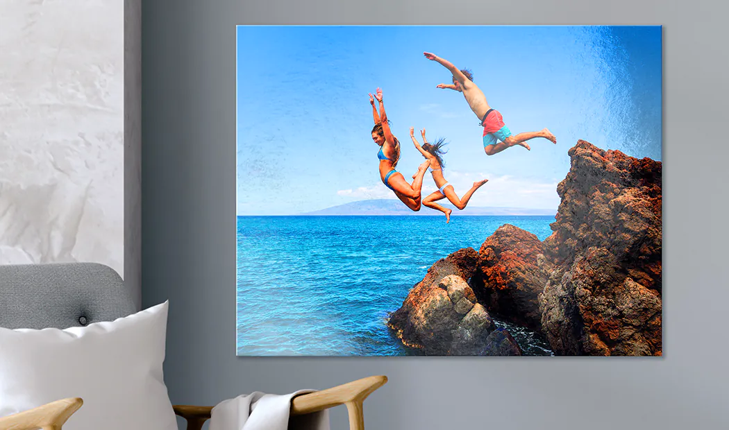 Metal Photo Print by Printerpix|Personalised metal photo print: Three friends leap from rocks into a vibrant turquoise ocean.  A stunning, bespoke piece for your home.|Metal photo prints:  Various sizes shown on a wall, showcasing cherished memories. Create yours today!|Stunning personalised London skyline print on ultra-slim, premium aluminium.  High-definition image with chromatic shine. Ready to hang.|Happy couple in a yellow flower field; personalised metal prints & blocks.|Personalised Beauty & the Beast-inspired print:  A couple waltzes, she in a flowing yellow gown, he in a teal coat.  Romantic & bespoke!|||||
