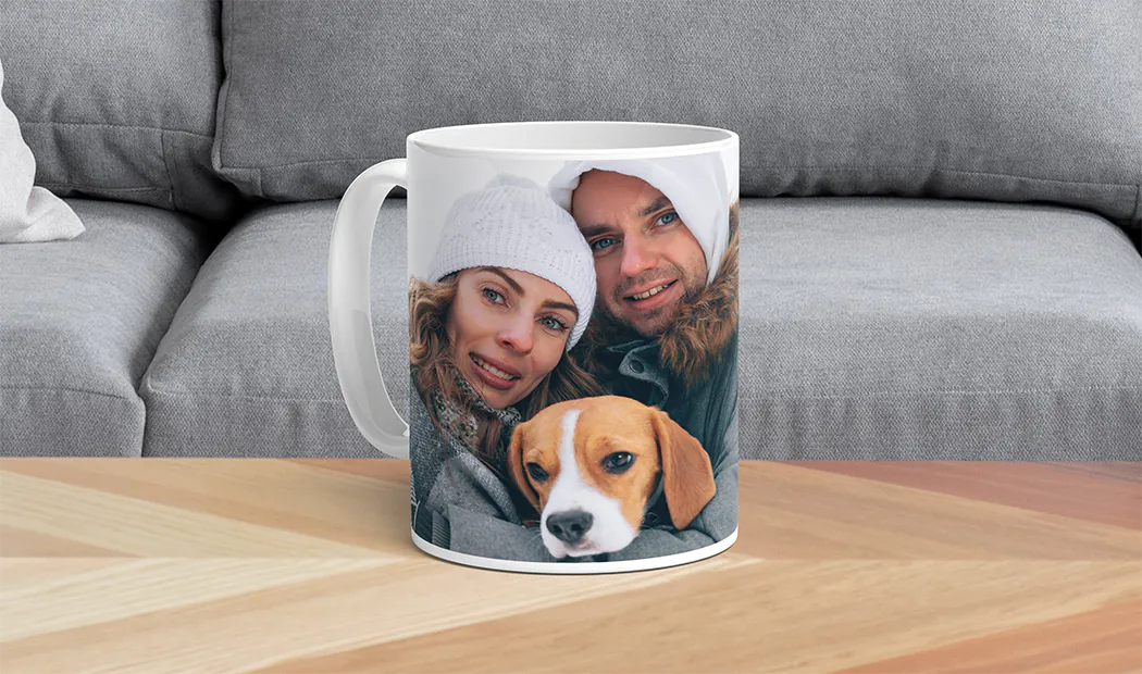 Personalised Photo Mugs by Printerpix|Mum and baby holding Printerpix cartoon design custom mug with dad text|Personalised photo mug with picture of baby crawling wearing animal overall|Mum and daughter holding custom designed photo mugs with family photos|Kissing couple with personalised mugs with text on|Personalised photo mug with your own photo of a dog on|||||