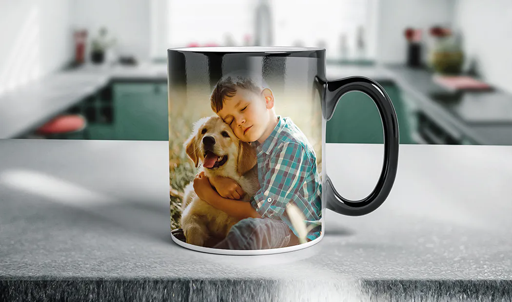 Printerpix Custom magic heat changing mug with personalised photo of a baby revealed|Personalised magic mug: Boy cuddling golden retriever, revealed with heat.|Personalised magic mugs: reveal your photo with warmth!  Three mugs, one showing a cute baby.|Personalised magic mug:  High-def Santa design revealed with hot drinks.  Fully customisable, high-quality ceramic.|Personalised magic mug featuring a vibrant photo; a unique gift idea.|Personalised magic mug; steaming hot drink reveals adorable baby photo.  Unique gift!|||||