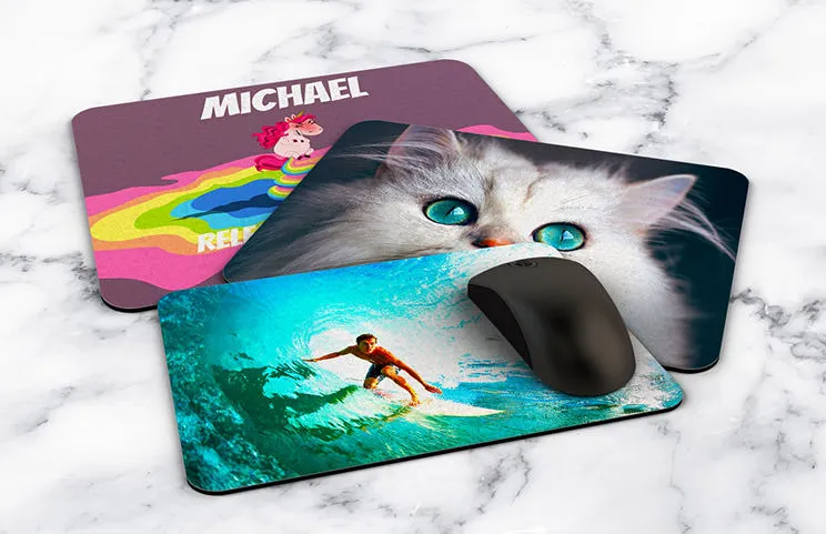 Personalised mouse mats:  Vibrant designs, featuring unicorns, cats, & surfers.  Create your unique style!