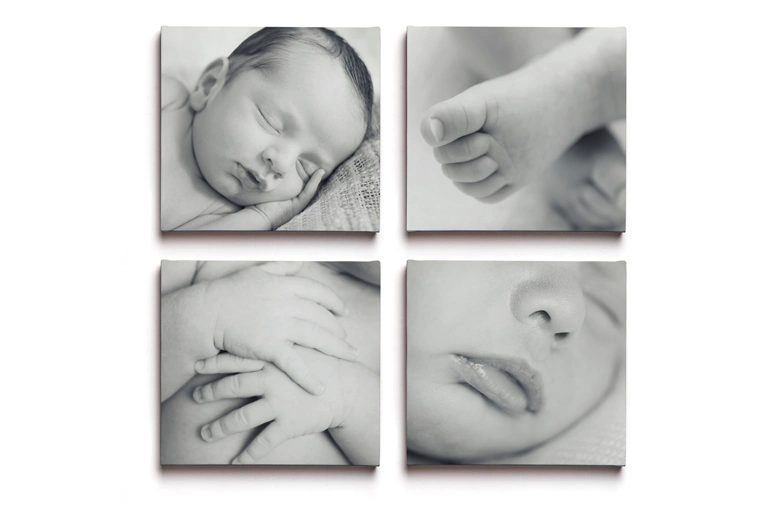 Man and woman putting up a photo canvas with a holiday photo on