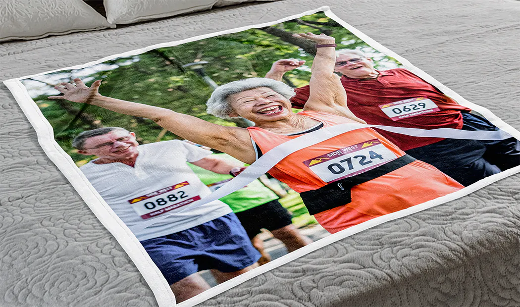 Large photo blanket on double bed with picture of girl photo