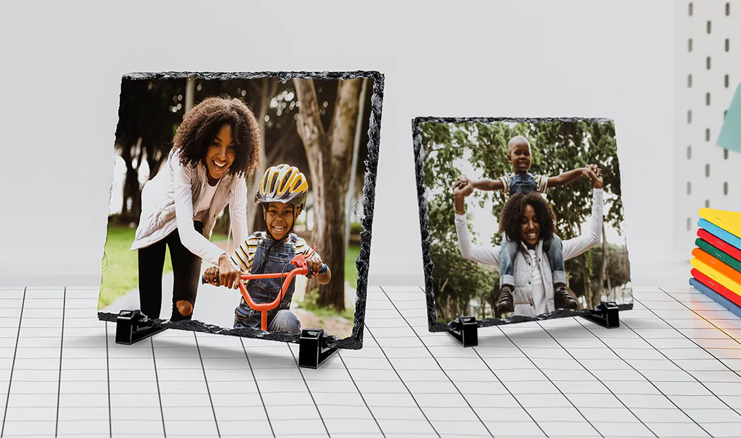 side view of stone slate with baby and mum and dad