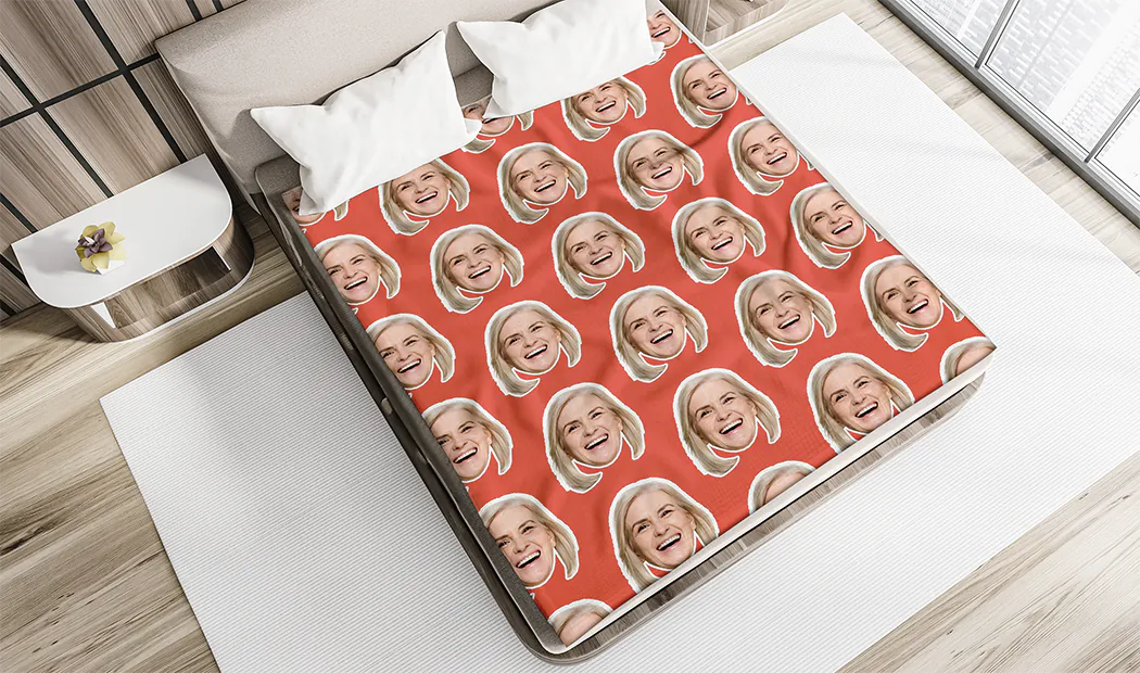 Large photo blanket on double bed with picture of girl photo