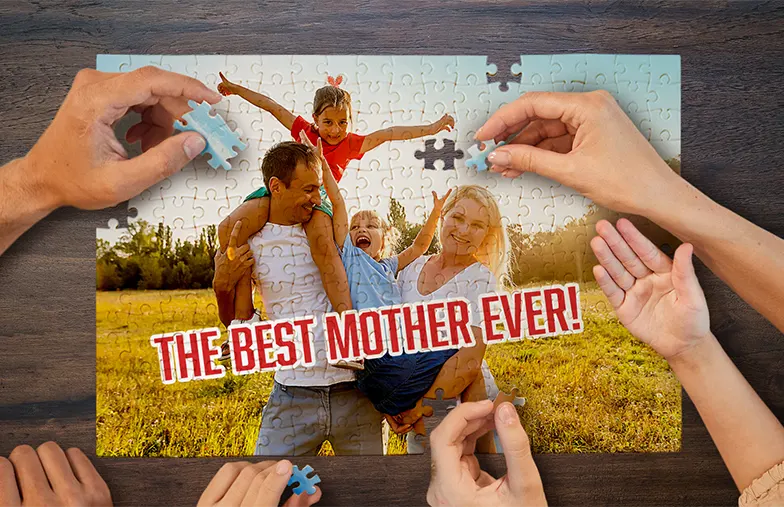 Personalised jigsaw puzzle: family photo, "The Best Mother Ever!", being assembled. A unique gift!