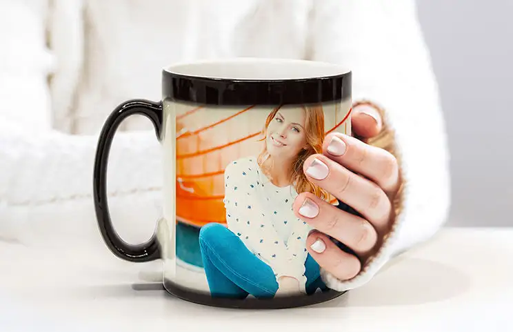 Personalised magic mug featuring a vibrant photo; a unique gift idea.
